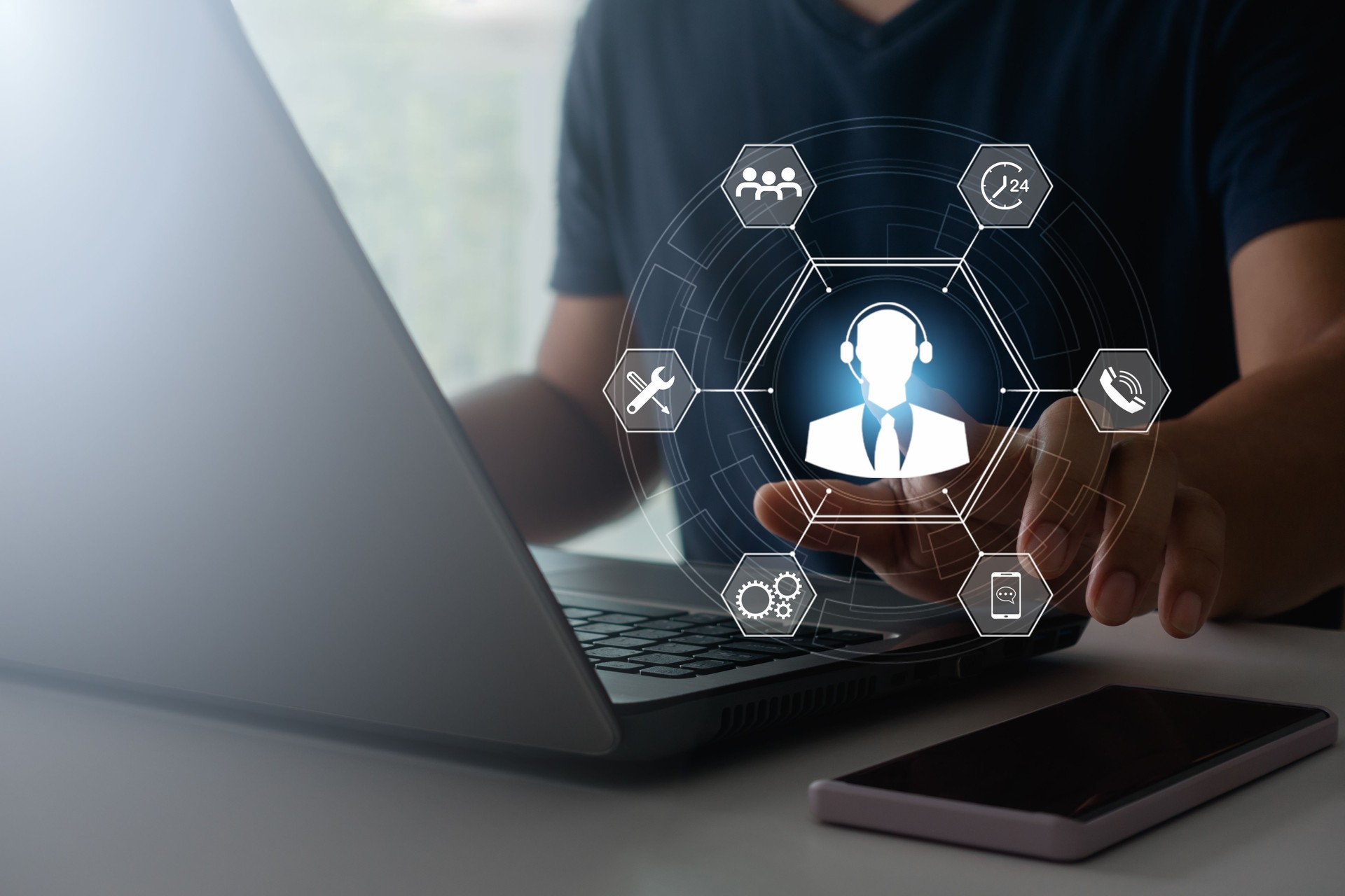 Technical support customer service concept. Person using laptop computer with VR screen supports customer icons, business technology on internet, IT support call center, and customer service help.